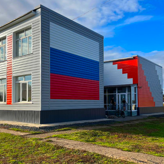 Фасад МБОУ СОШ из металло сайдинга Евро-Брус под брус цвета в ассортименте